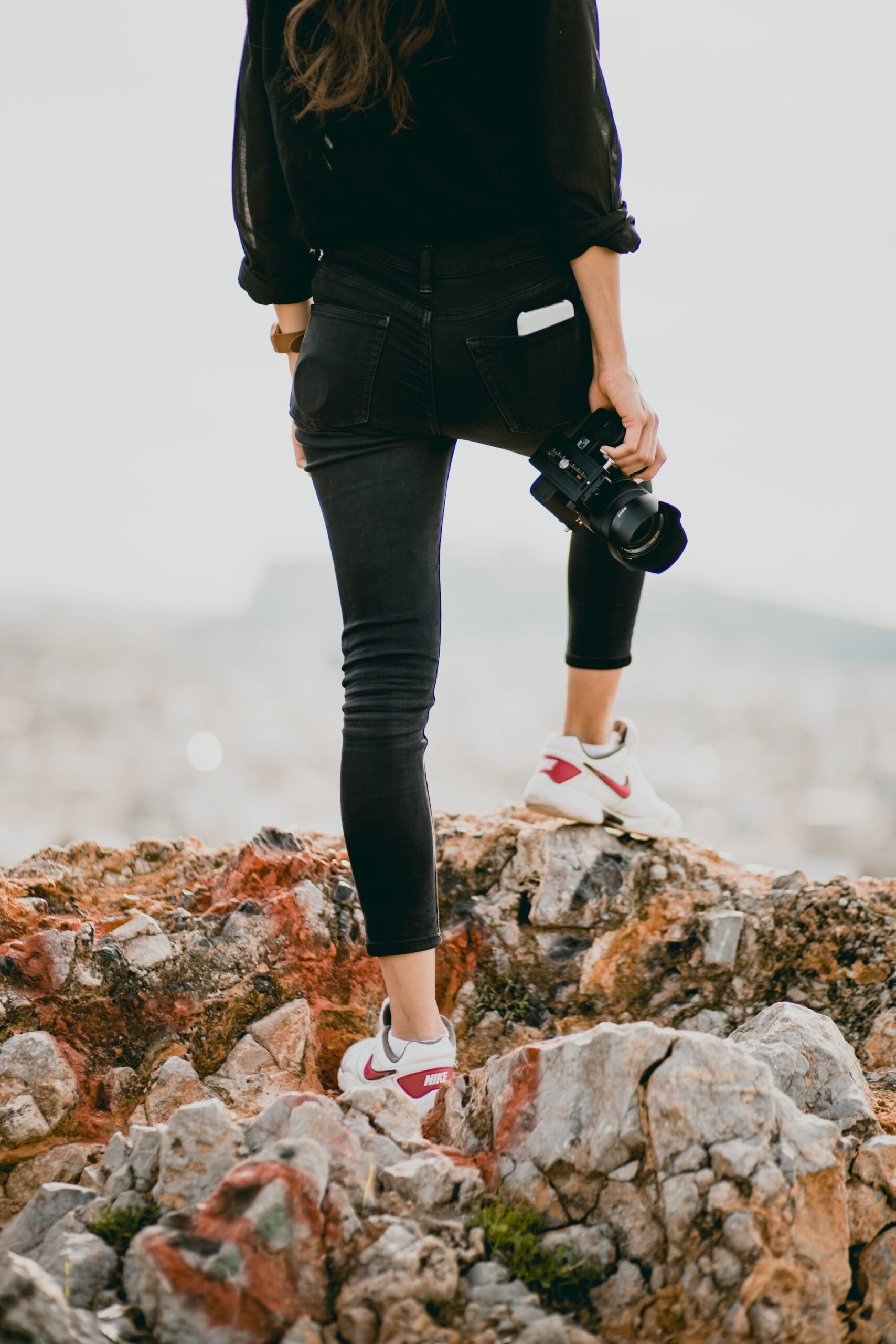 A picture of a woman with a camera